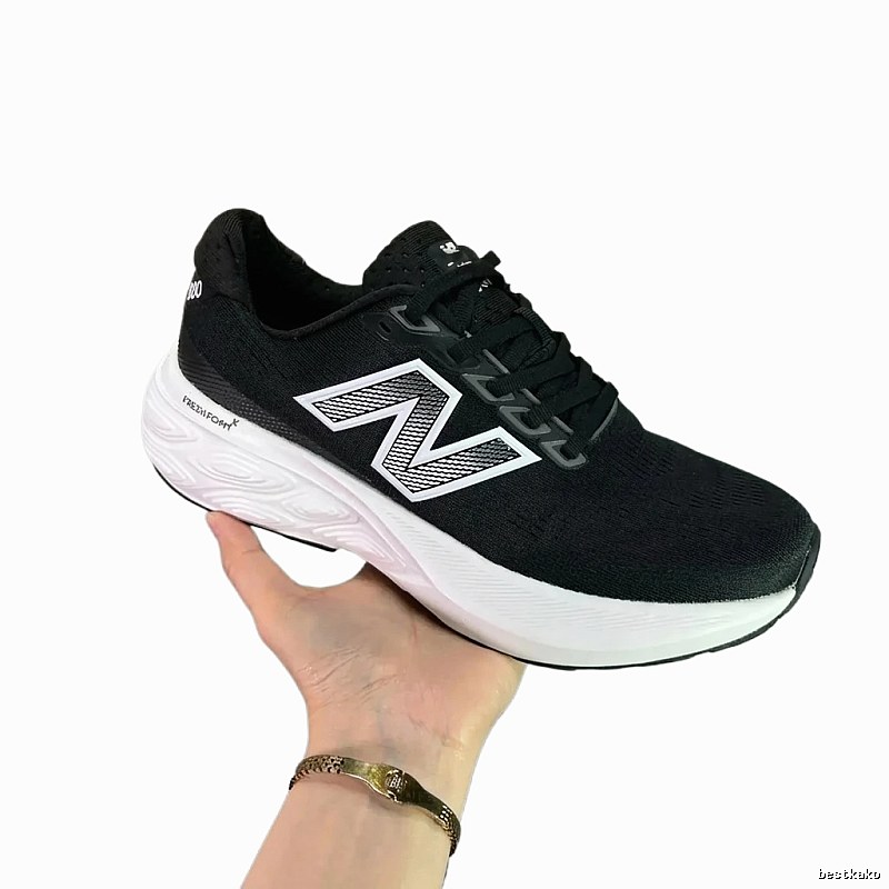 New Balance Fresh Foam X black and white sports shoes