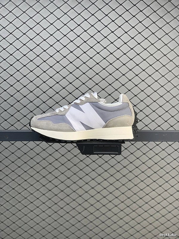 New Balance Pale Gray Retro Runners Highlighting Dynamic Sole Shape