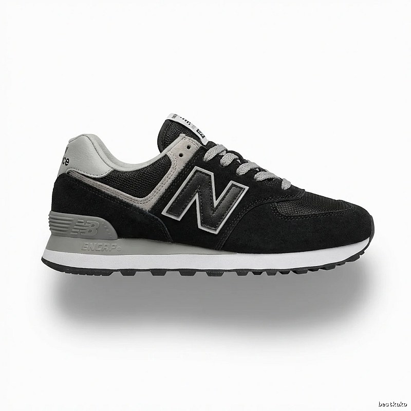 New Balance retro-style black and grey sports shoes